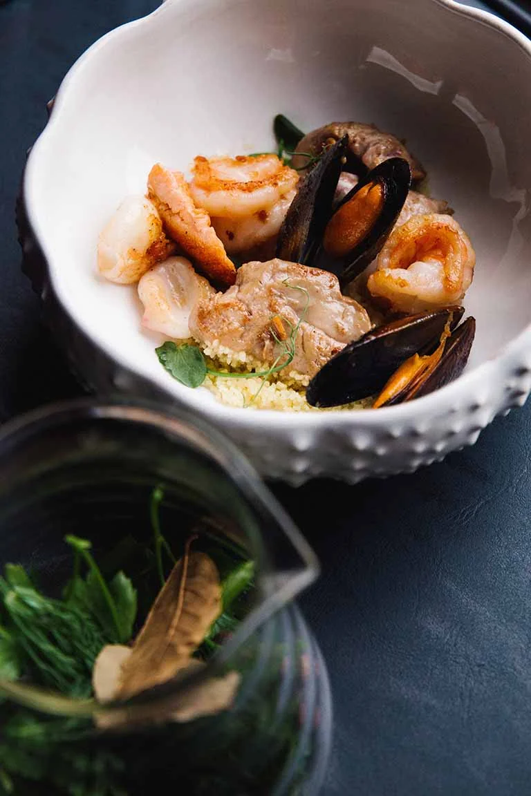 Fans watching a soccer match at G.O.A.T's Arena