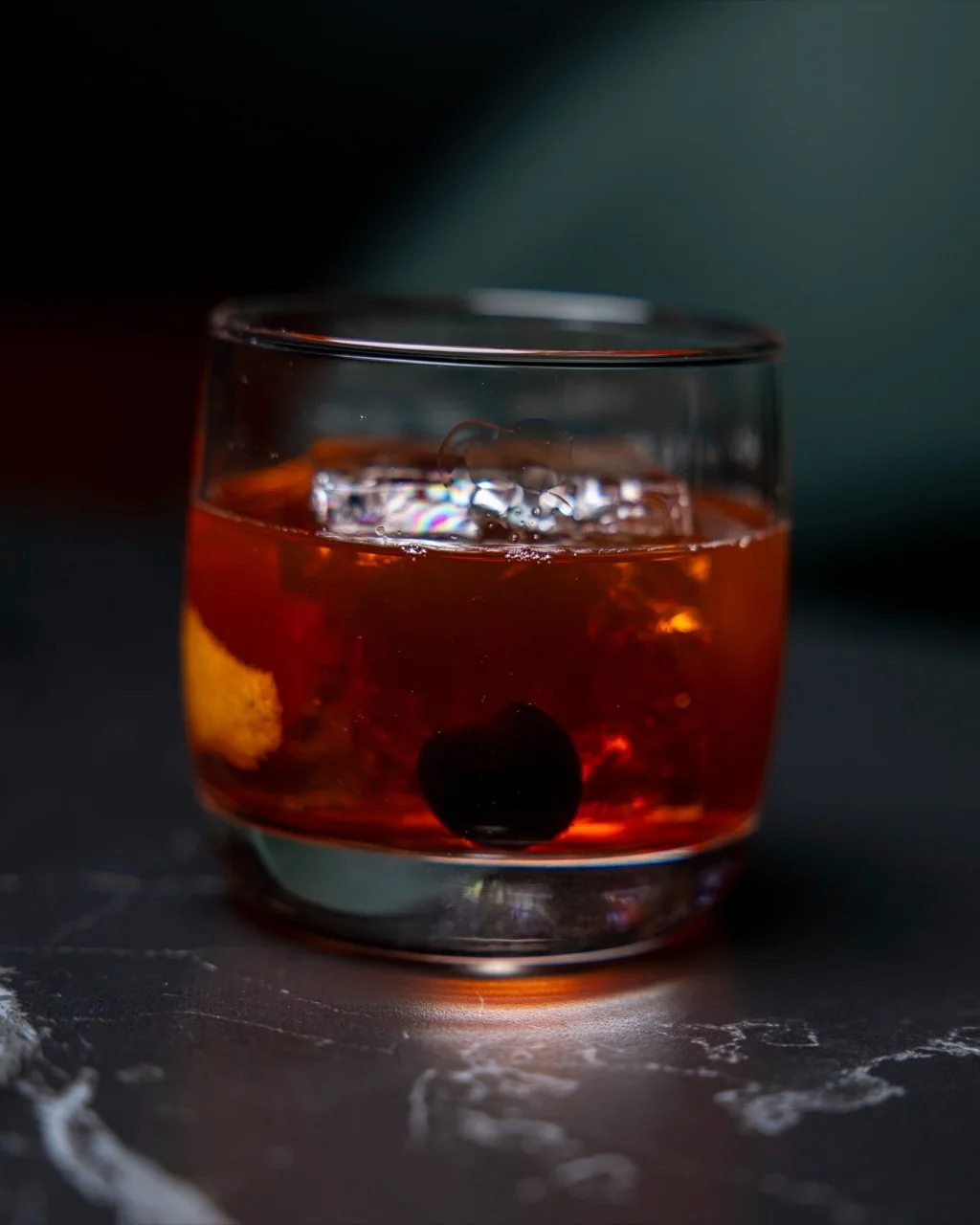 A vibrant bar with cocktails and sports screens