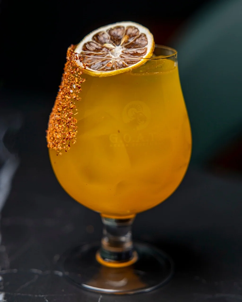 A craft cocktail served at a sports bar