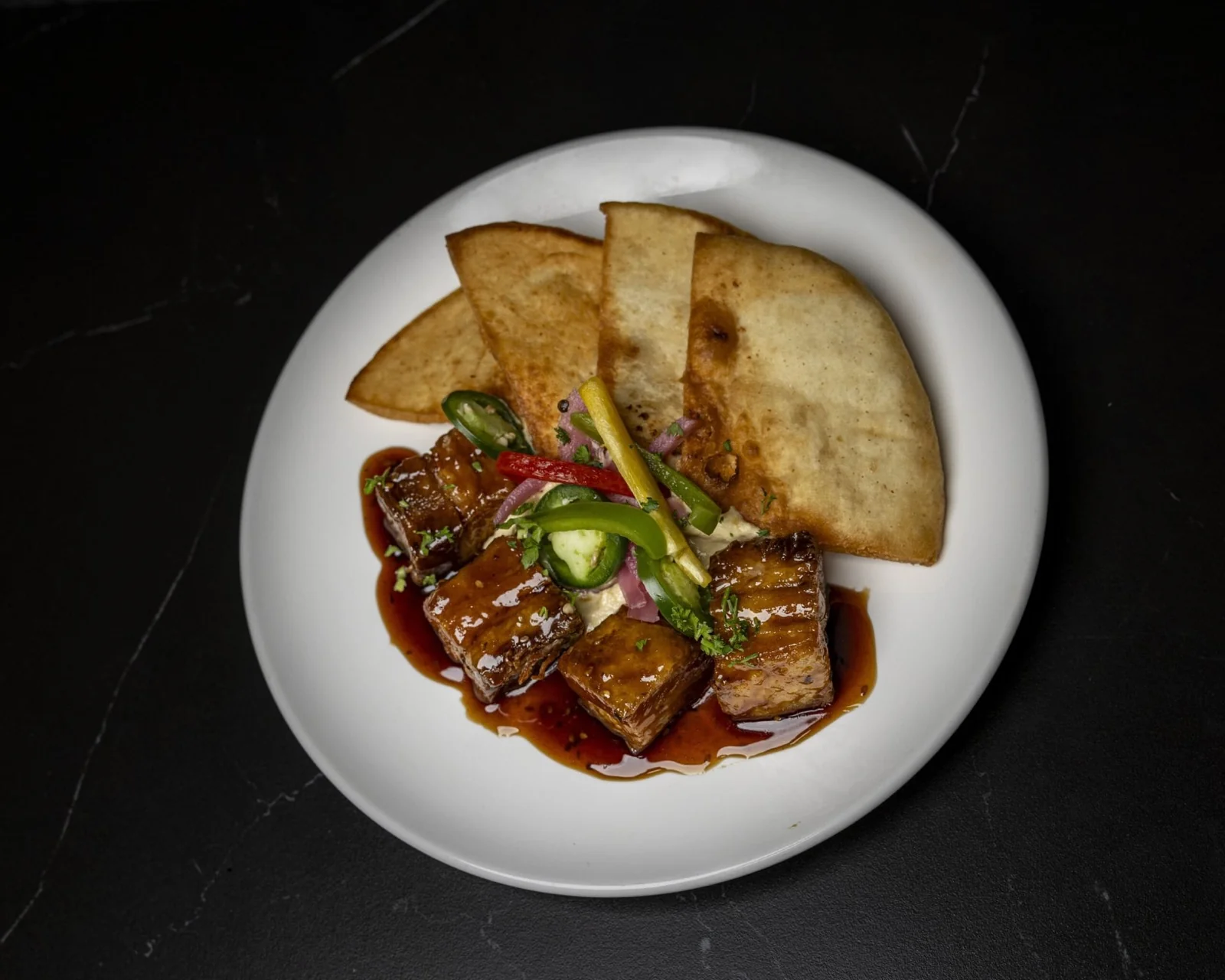 G.O.A.T's Arena Northlake interior with viewing wall and bar seating